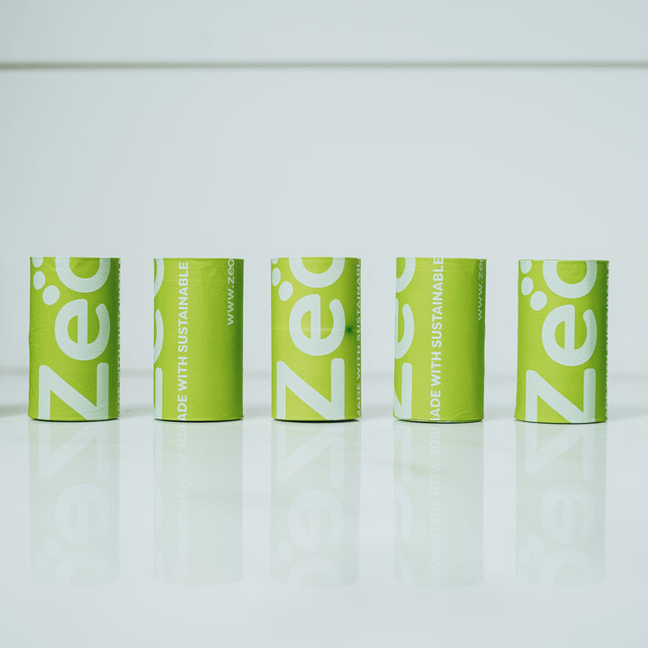 Image of bright green dog bag rolls and Zeofill logo printed. 